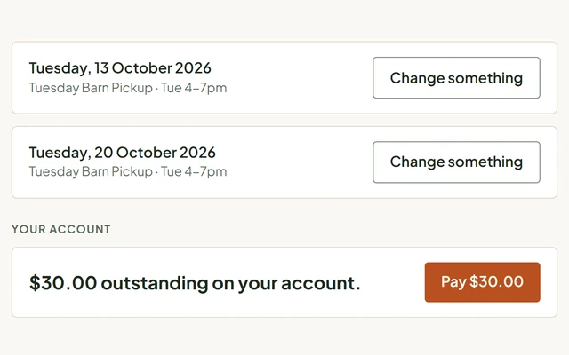A member's own page on the farm's site: their upcoming boxes and what they owe, with a button to pay it